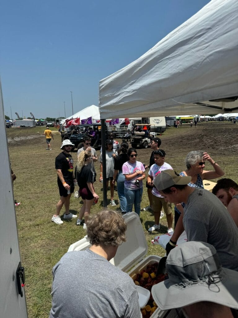 A Flavorful Partnership: STS and Data Projections at the Big Crawfish Bash 5 We Are Open! Serving the attendees.