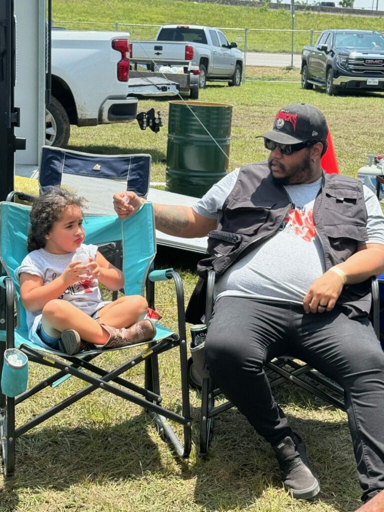 A Flavorful Partnership: STS and Data Projections at the Big Crawfish Bash 22 Family enjoying the day