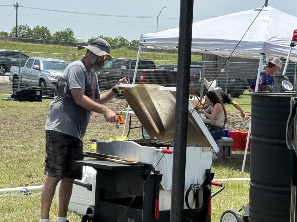 A Flavorful Partnership: STS and Data Projections at the Big Crawfish Bash 11 David managing the crawfish station