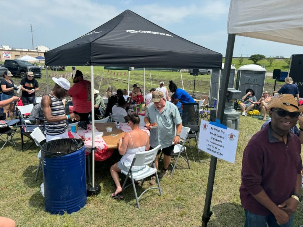 A Flavorful Partnership: STS and Data Projections at the Big Crawfish Bash 4 Attendees enjoying the crawfisha