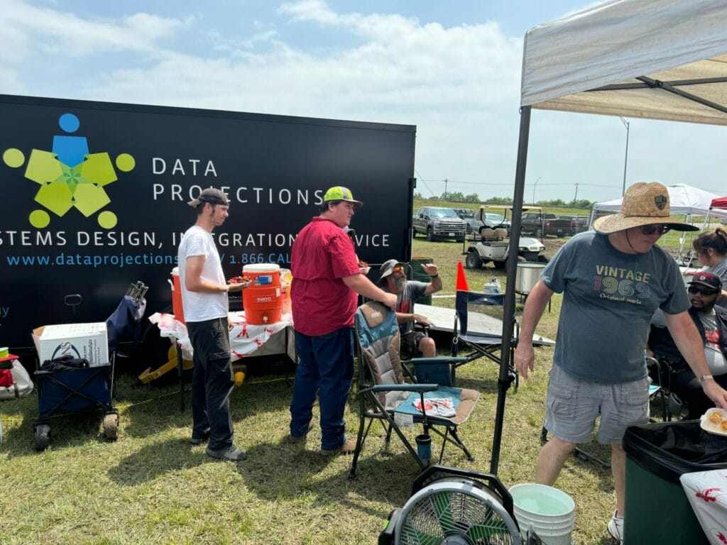 A Flavorful Partnership: STS and Data Projections at the Big Crawfish Bash 10 Data Projections Team